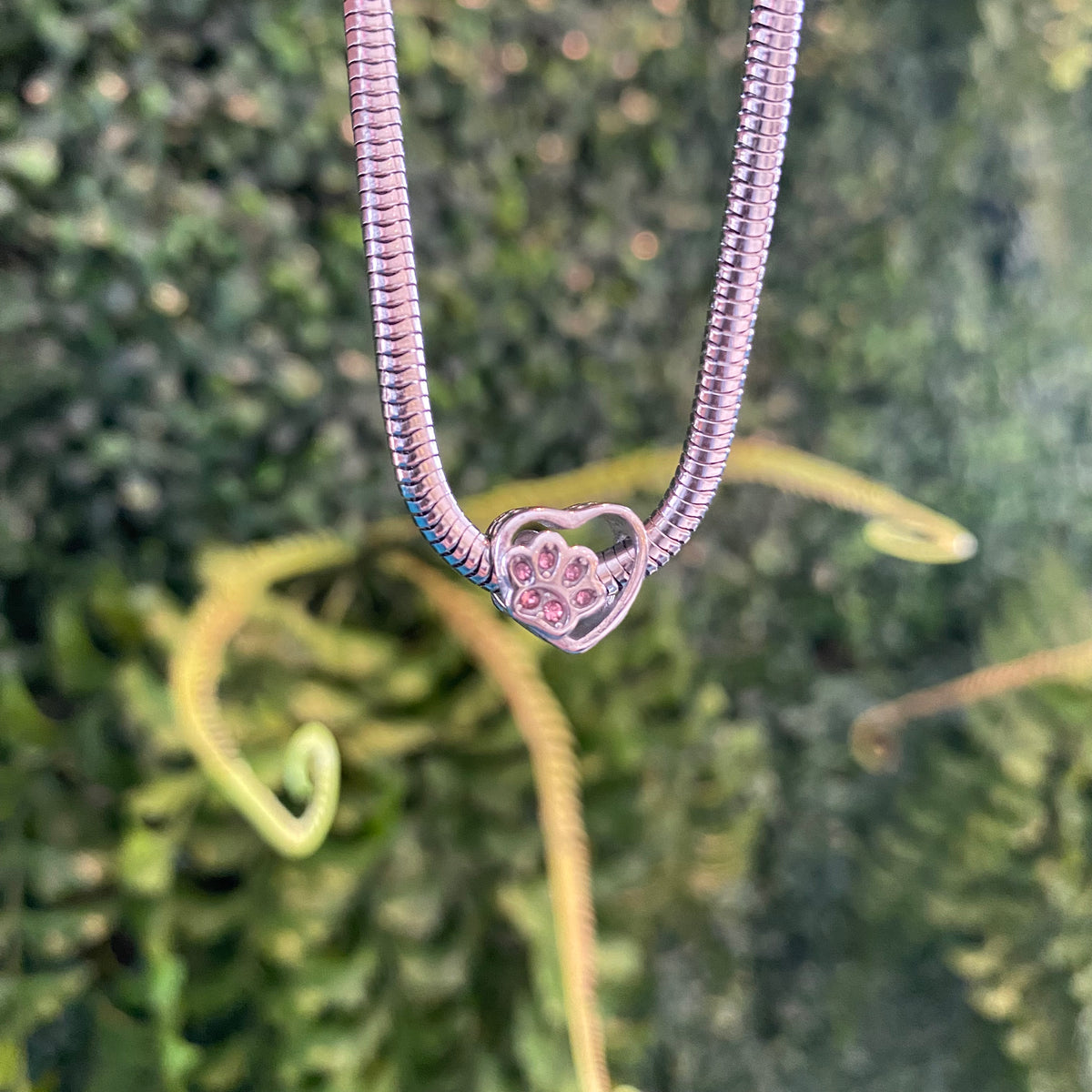 Berloque Coração vazado Rosa