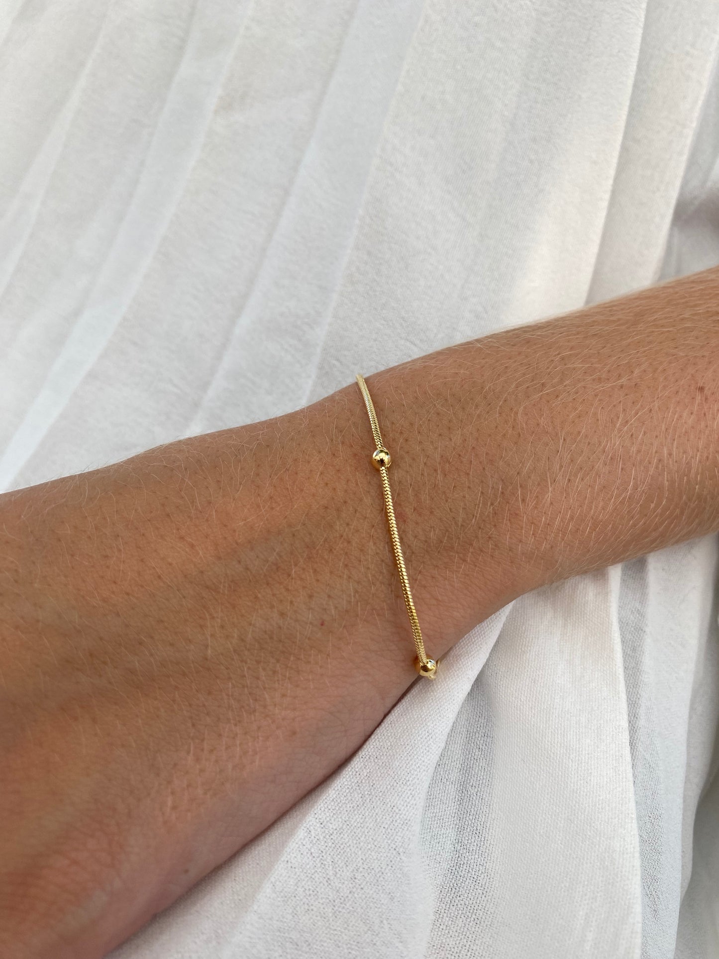 Pulseira Lisa Bolinha Banhada a Ouro 18K